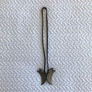 Metal butterfly necklace.